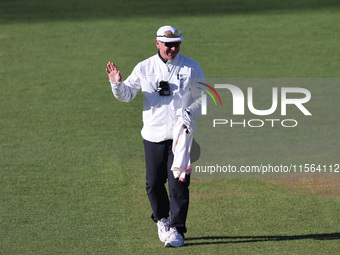 Umpire Graham Lloyd during the Vitality County Championship match between Durham Cricket and Lancashire at the Seat Unique Riverside in Ches...