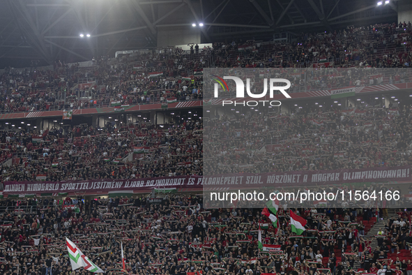 Hungarian fans and tricolor flags during the national anthem before the UEFA Nations League Group A3 match at Puskas Arena in Budapest, Hung...