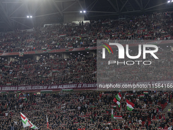 Hungarian fans and tricolor flags during the national anthem before the UEFA Nations League Group A3 match at Puskas Arena in Budapest, Hung...