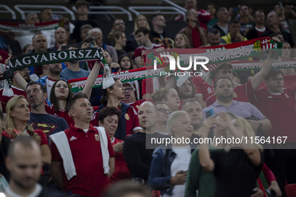 Hungarian fans and tricolor flags during the national anthem before the UEFA Nations League Group A3 match at Puskas Arena in Budapest, Hung...