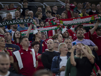 Hungarian fans and tricolor flags during the national anthem before the UEFA Nations League Group A3 match at Puskas Arena in Budapest, Hung...