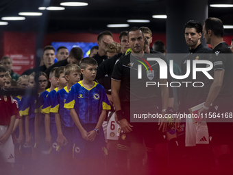 Dominik Szoboszlai and the Hungarian football team stand before the UEFA Nations League Group A3 match at Puskas Arena in Budapest, Hungary,...