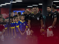 Dominik Szoboszlai and the Hungarian football team stand before the UEFA Nations League Group A3 match at Puskas Arena in Budapest, Hungary,...