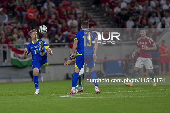 Dzenis Burnic of Bosnia and Herzegovina competes for the ball during the UEFA Nations League Group A3 match at Puskas Arena in Budapest, Hun...