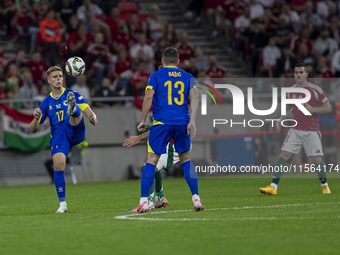 Dzenis Burnic of Bosnia and Herzegovina competes for the ball during the UEFA Nations League Group A3 match at Puskas Arena in Budapest, Hun...