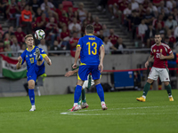 Dzenis Burnic of Bosnia and Herzegovina competes for the ball during the UEFA Nations League Group A3 match at Puskas Arena in Budapest, Hun...