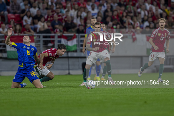 Dominik Szoboszlai of Hungary competes for the ball with Dario Saric of Bosnia and Herzegovina during the UEFA Nations League Group A3 match...