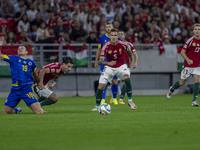 Dominik Szoboszlai of Hungary competes for the ball with Dario Saric of Bosnia and Herzegovina during the UEFA Nations League Group A3 match...