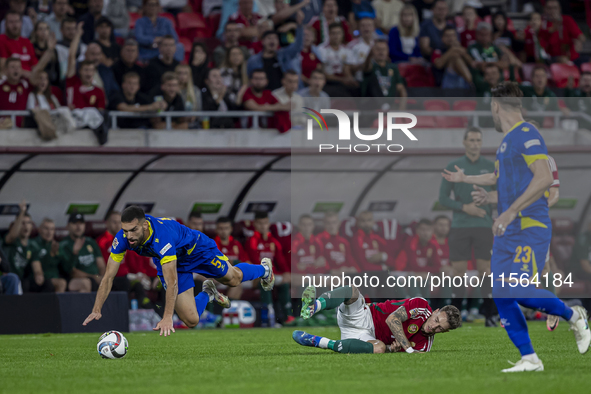 Adrian Leon Barisic of Bosnia and Herzegovina competes for the ball with Bendeguz Bolla of Hungary during the UEFA Nations League Group A3 m...