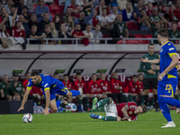 Adrian Leon Barisic of Bosnia and Herzegovina competes for the ball with Bendeguz Bolla of Hungary during the UEFA Nations League Group A3 m...