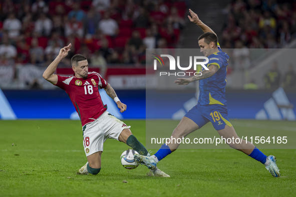 Zsolt Nagy of Hungary competes for the ball with Dario Saric of Bosnia and Herzegovina during the UEFA Nations League Group A3 match at Pusk...