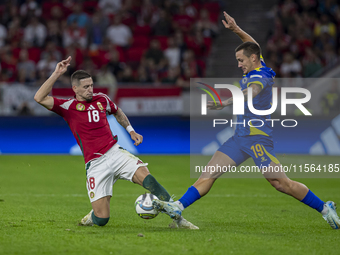 Zsolt Nagy of Hungary competes for the ball with Dario Saric of Bosnia and Herzegovina during the UEFA Nations League Group A3 match at Pusk...