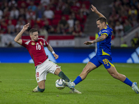 Zsolt Nagy of Hungary competes for the ball with Dario Saric of Bosnia and Herzegovina during the UEFA Nations League Group A3 match at Pusk...