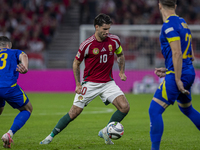 Dominik Szoboszlai of Hungary competes for the ball with Ivan Basic of Bosnia and Herzegovina during the UEFA Nations League Group A3 match...