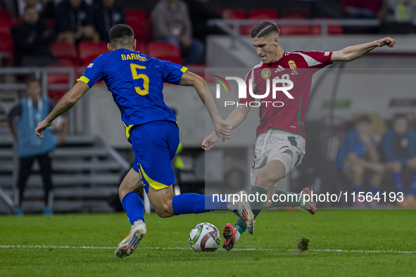 Roland Sallai of Hungary competes for the ball with Adrian Leon Barisic of Bosnia and Herzegovina during the UEFA Nations League Group A3 ma...