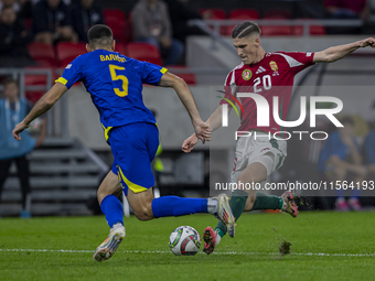 Roland Sallai of Hungary competes for the ball with Adrian Leon Barisic of Bosnia and Herzegovina during the UEFA Nations League Group A3 ma...