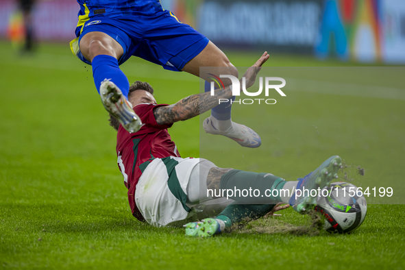 Endre Botka of Hungary competes for the ball with Benjamin Tahirovic of Bosnia and Herzegovina during the UEFA Nations League Group A3 match...