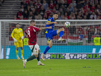 Adrian Leon Barisic of Bosnia and Herzegovina competes for the ball with Martin Adam of Hungary during the UEFA Nations League Group A3 matc...