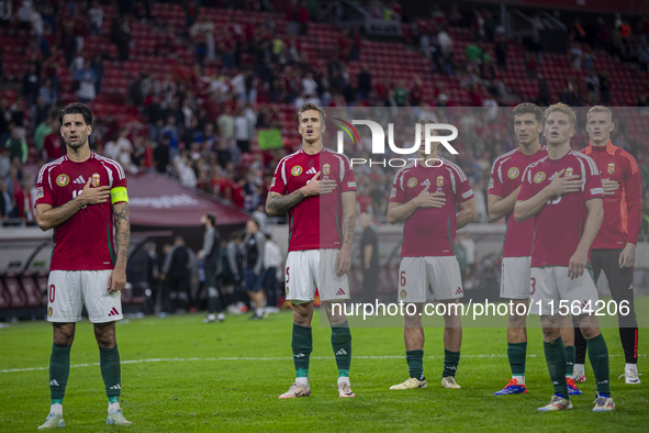 Hungarian fans and tricolor flags during the national anthem before the UEFA Nations League Group A3 match at Puskas Arena in Budapest, Hung...