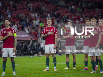 Hungarian fans and tricolor flags during the national anthem before the UEFA Nations League Group A3 match at Puskas Arena in Budapest, Hung...