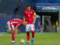 In Andorra La Vella, Andorra, on September 10, 2024, Matthew Guillaumier of Malta and Teddy Teuma of Malta are in action during the UEFA Nat...