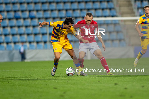 Joan Cervos of Andorra and Ryan Camenzuli of Malta are in action during the UEFA Nations League 2024 - League phase - Matchday 2 match betwe...