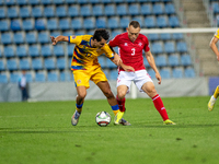 Joan Cervos of Andorra and Ryan Camenzuli of Malta are in action during the UEFA Nations League 2024 - League phase - Matchday 2 match betwe...