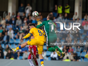 Ricard Fernandez of Andorra and Henry Bonello of Malta are in action during the UEFA Nations League 2024 - League phase - Matchday 2 match b...