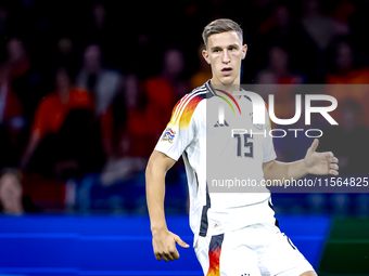 Germany defender Nico Schlotterbeck plays during the match between the Netherlands and Germany at the Johan Cruijff ArenA for the UEFA Natio...