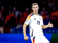 Germany defender Nico Schlotterbeck plays during the match between the Netherlands and Germany at the Johan Cruijff ArenA for the UEFA Natio...