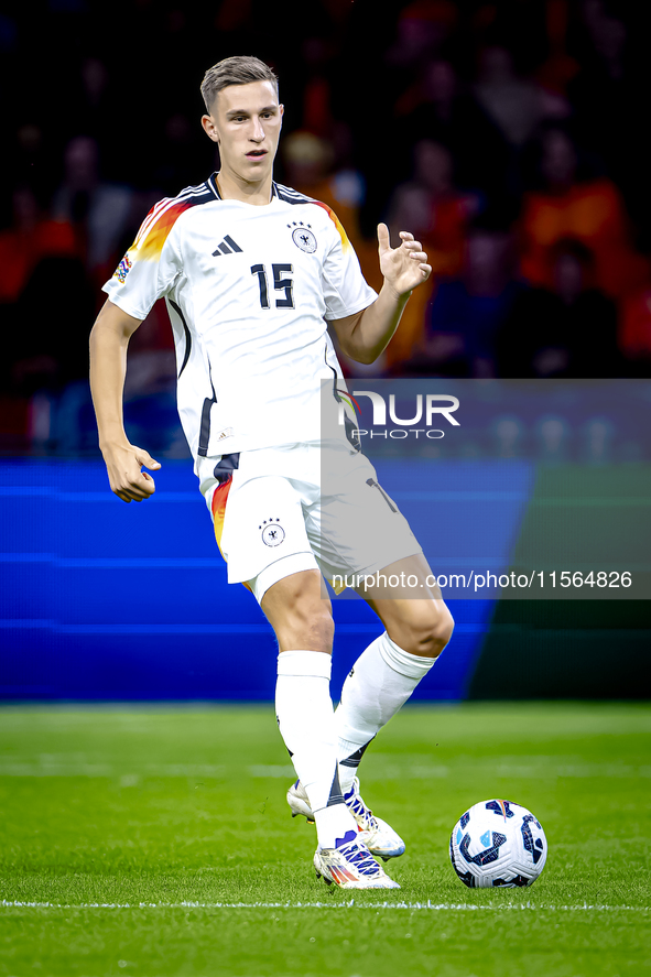 Germany defender Nico Schlotterbeck plays during the match between the Netherlands and Germany at the Johan Cruijff ArenA for the UEFA Natio...