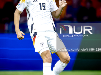 Germany defender Nico Schlotterbeck plays during the match between the Netherlands and Germany at the Johan Cruijff ArenA for the UEFA Natio...