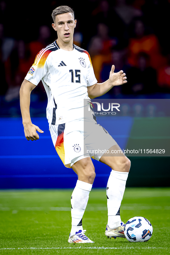 Germany defender Nico Schlotterbeck plays during the match between the Netherlands and Germany at the Johan Cruijff ArenA for the UEFA Natio...