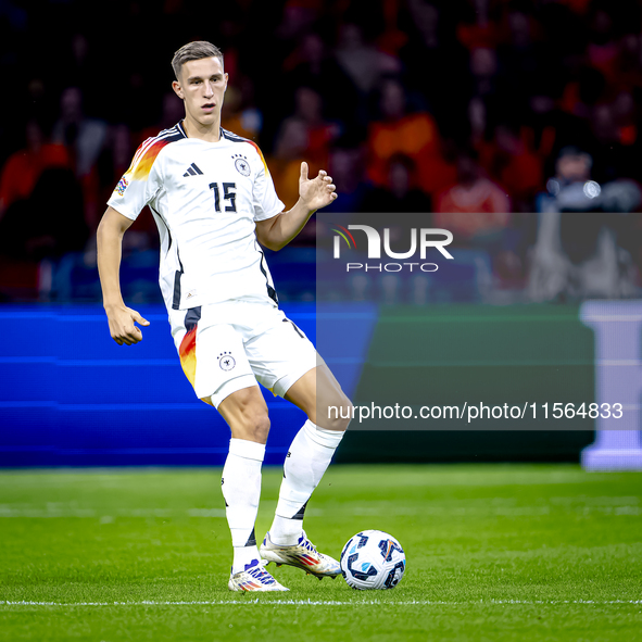 Germany defender Nico Schlotterbeck plays during the match between the Netherlands and Germany at the Johan Cruijff ArenA for the UEFA Natio...