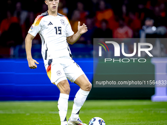 Germany defender Nico Schlotterbeck plays during the match between the Netherlands and Germany at the Johan Cruijff ArenA for the UEFA Natio...