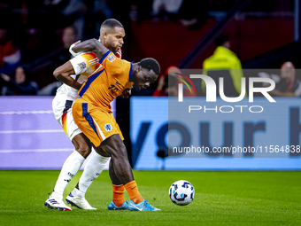 Germany defender Jonathan Tah and Netherlands forward Brian Brobbey during the match between the Netherlands and Germany at the Johan Cruijf...