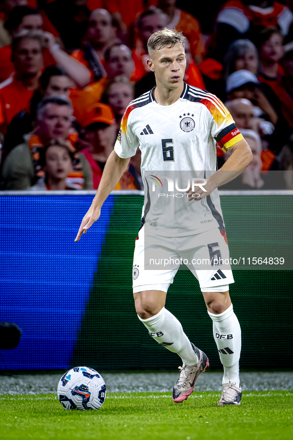 Germany midfielder Joshua Kimmich plays during the match between the Netherlands and Germany at the Johan Cruijff ArenA for the UEFA Nations...