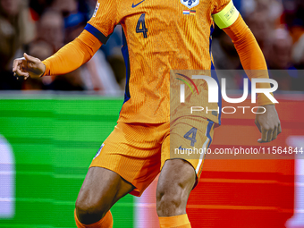 Netherlands defender Virgil van Dijk plays during the match between the Netherlands and Germany at the Johan Cruijff ArenA for the UEFA Nati...