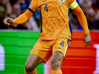 Netherlands defender Virgil van Dijk plays during the match between the Netherlands and Germany at the Johan Cruijff ArenA for the UEFA Nati...