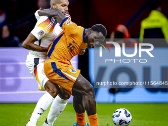 Germany defender Jonathan Tah and Netherlands forward Brian Brobbey during the match between the Netherlands and Germany at the Johan Cruijf...