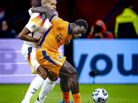 Germany defender Jonathan Tah and Netherlands forward Brian Brobbey during the match between the Netherlands and Germany at the Johan Cruijf...