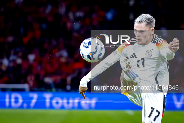 Germany midfielder Florian Wirtz plays during the match between the Netherlands and Germany at the Johan Cruijff ArenA for the UEFA Nations...