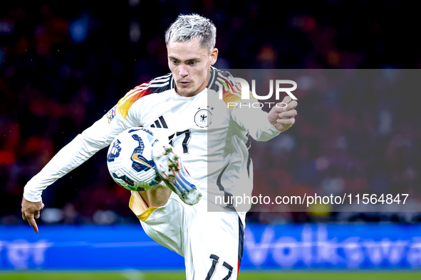 Germany midfielder Florian Wirtz plays during the match between the Netherlands and Germany at the Johan Cruijff ArenA for the UEFA Nations...