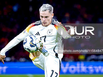 Germany midfielder Florian Wirtz plays during the match between the Netherlands and Germany at the Johan Cruijff ArenA for the UEFA Nations...