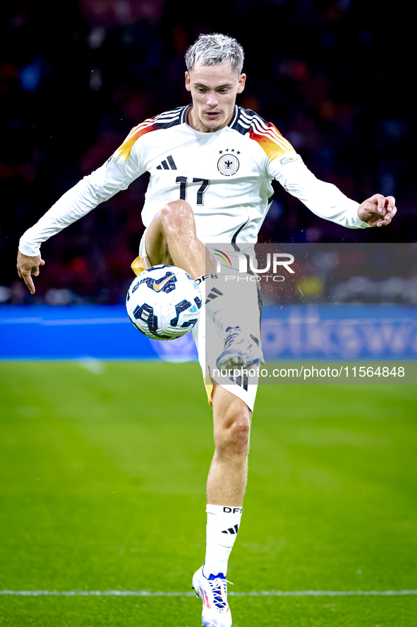 Germany midfielder Florian Wirtz plays during the match between the Netherlands and Germany at the Johan Cruijff ArenA for the UEFA Nations...