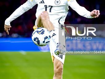 Germany midfielder Florian Wirtz plays during the match between the Netherlands and Germany at the Johan Cruijff ArenA for the UEFA Nations...