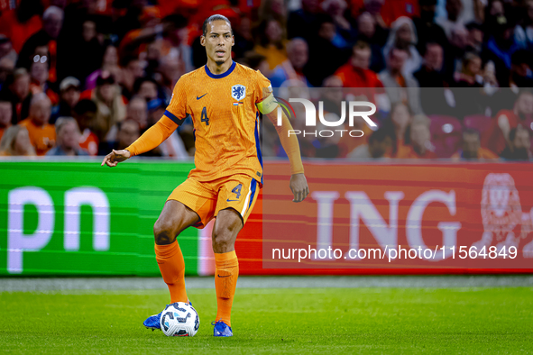 Netherlands defender Virgil van Dijk plays during the match between the Netherlands and Germany at the Johan Cruijff ArenA for the UEFA Nati...