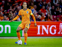 Netherlands defender Virgil van Dijk plays during the match between the Netherlands and Germany at the Johan Cruijff ArenA for the UEFA Nati...