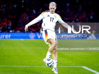 Germany midfielder Florian Wirtz plays during the match between the Netherlands and Germany at the Johan Cruijff ArenA for the UEFA Nations...