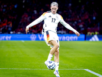 Germany midfielder Florian Wirtz plays during the match between the Netherlands and Germany at the Johan Cruijff ArenA for the UEFA Nations...